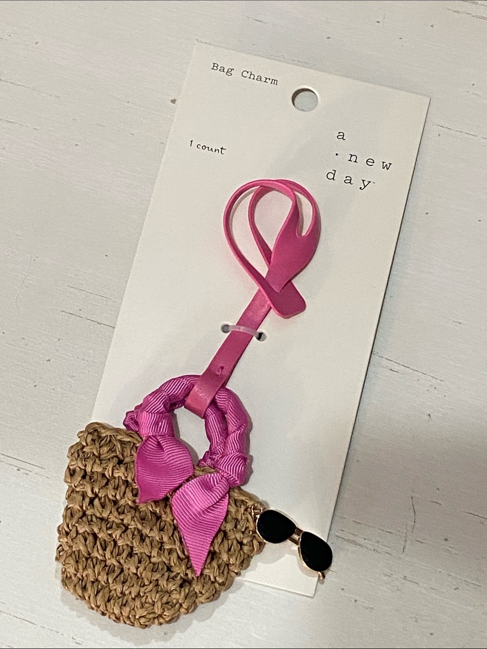a new day - Pink Ribbon Straw Bag Charm with Black Sunglasses Accent